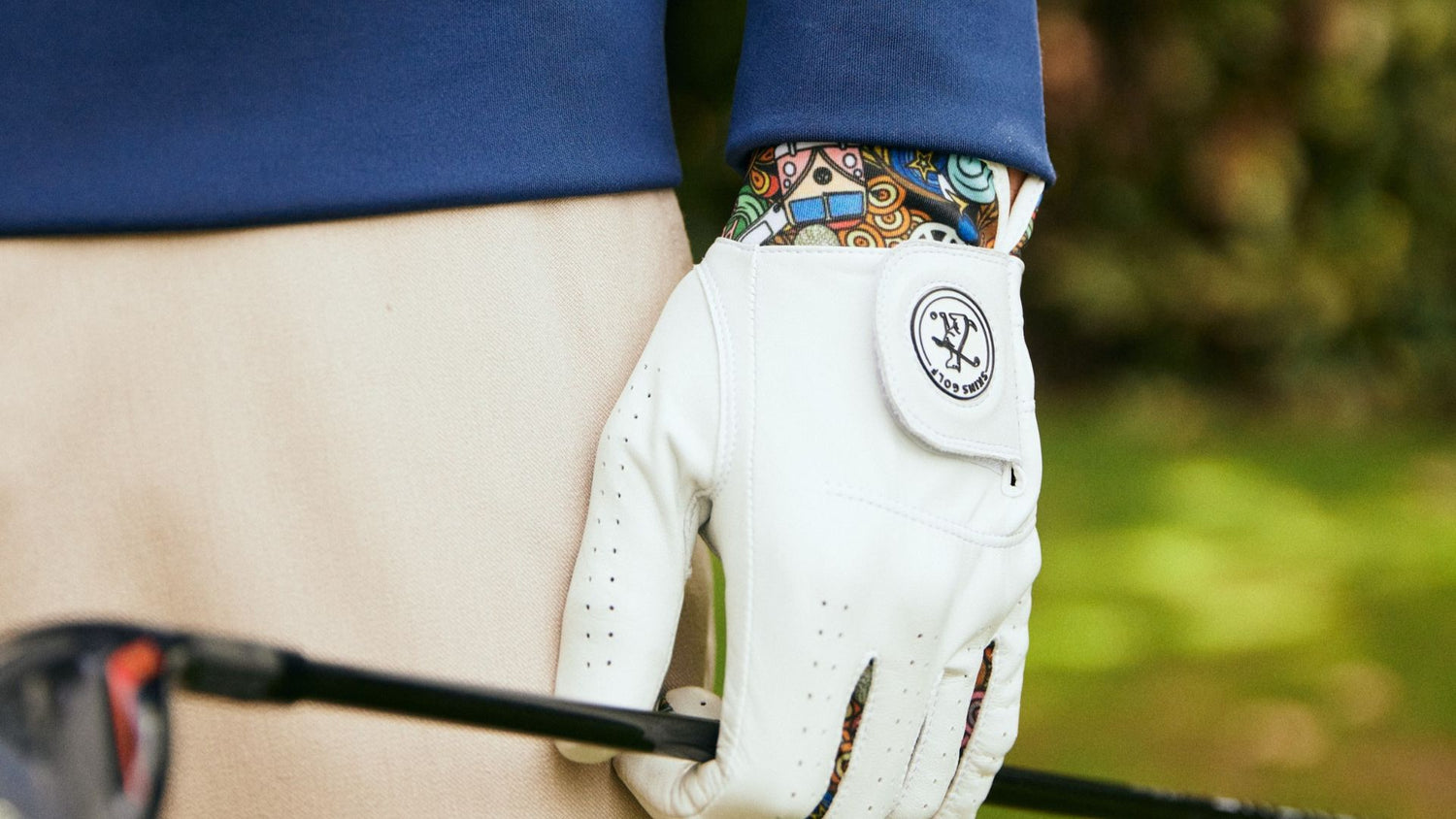 Golfer with golf glove, holding driver