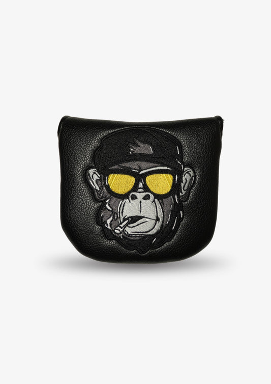 Black leather putter headcover for golf with a monkey design wearing sunglasses on a white background