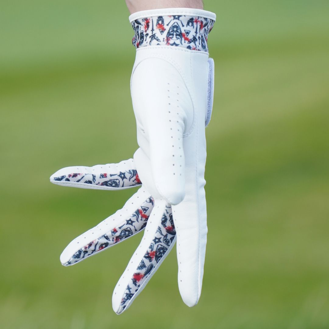 Golf glove with detailed design in between the fingers