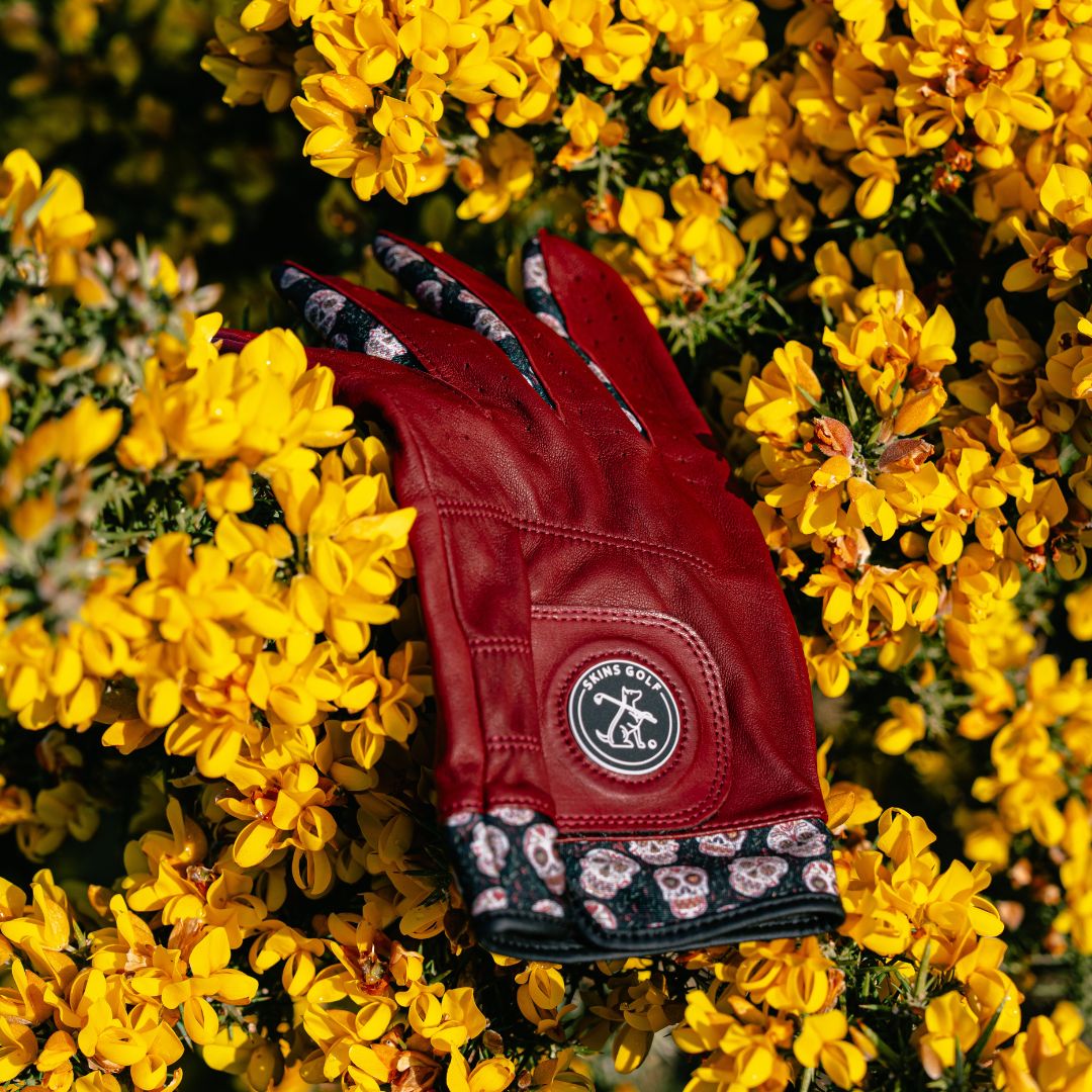 brown leather golf glove in yellow flowers