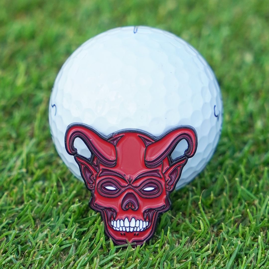 Devil golf ball marker
