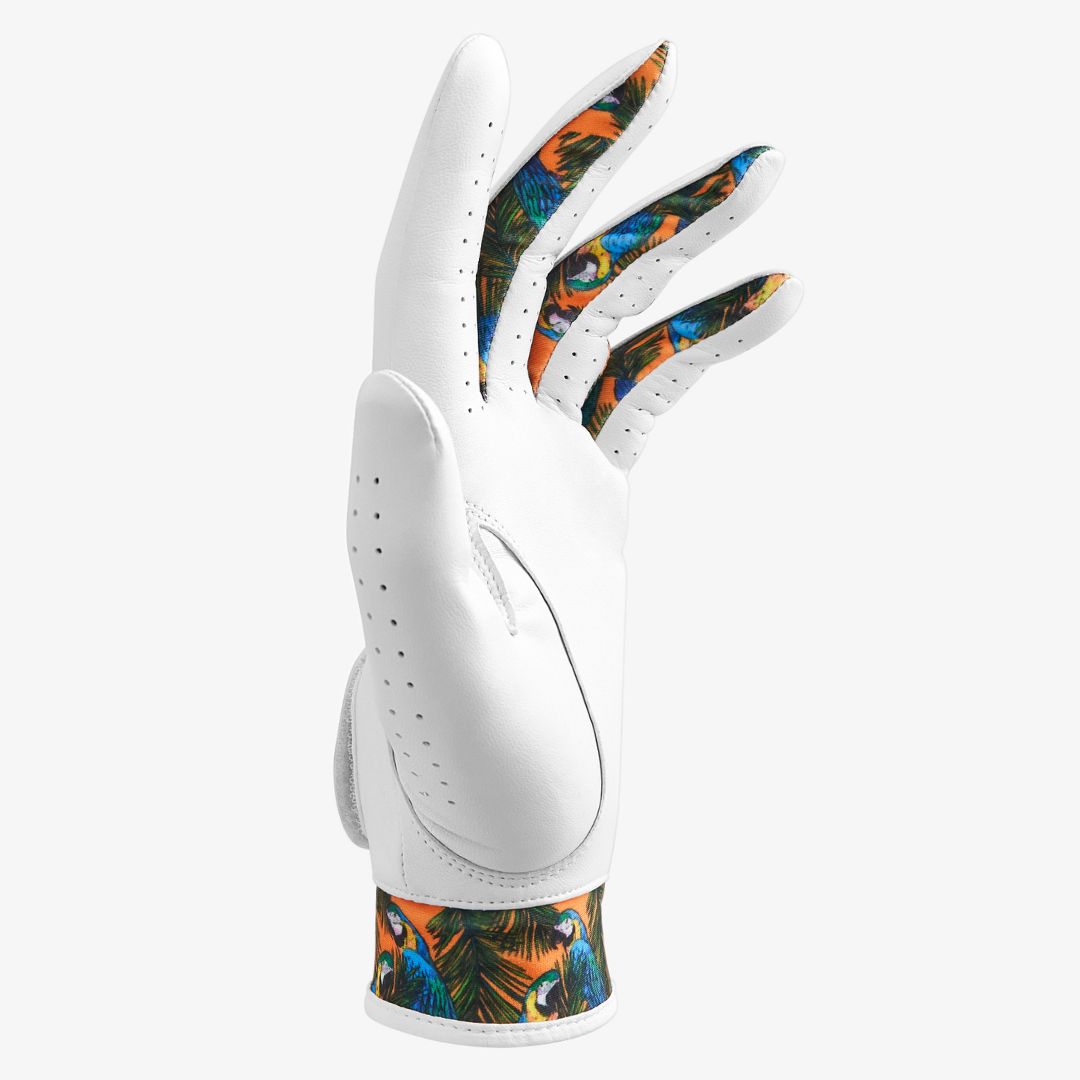 White golf glove with colorful parrot design on a white background