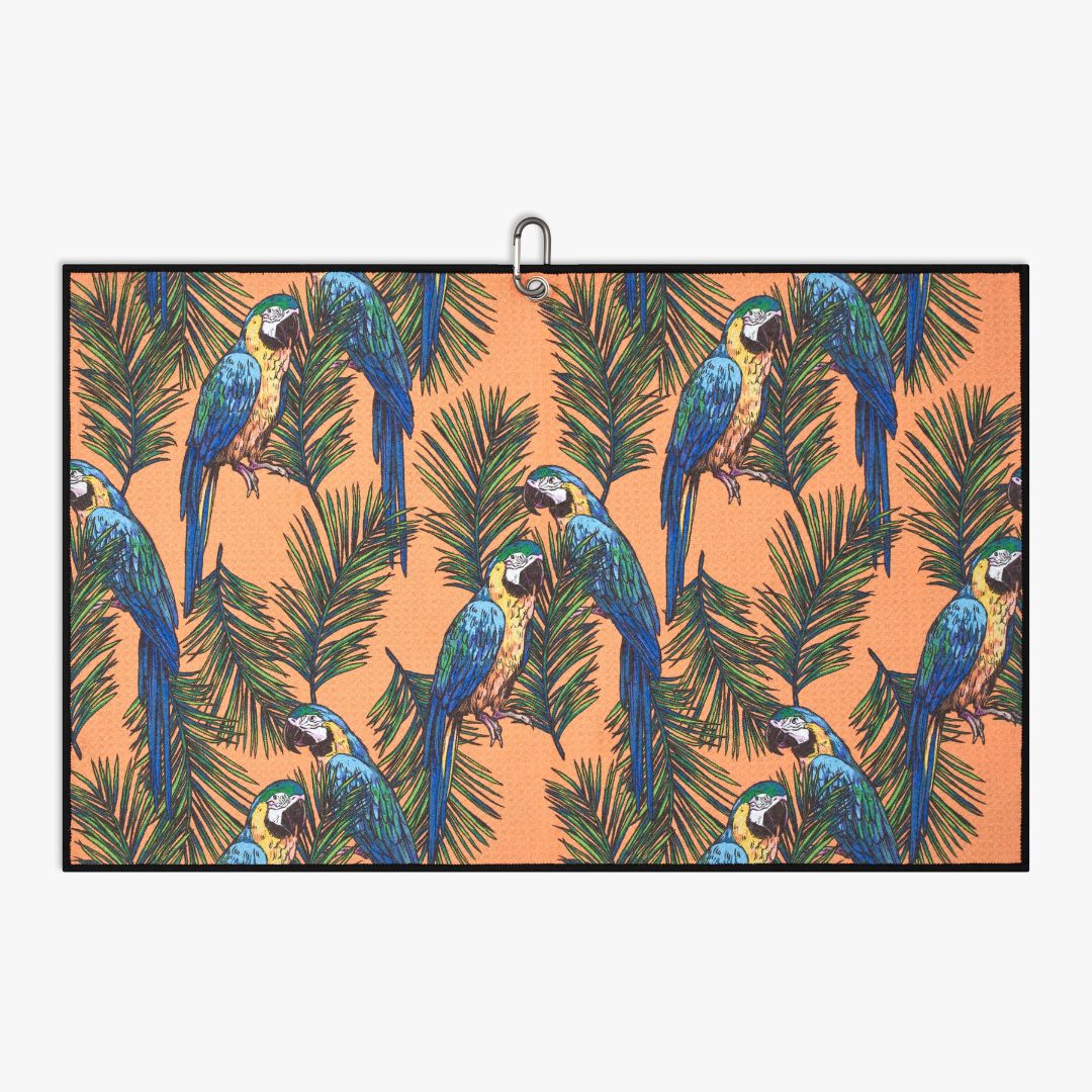 orange golf towel with tropical design