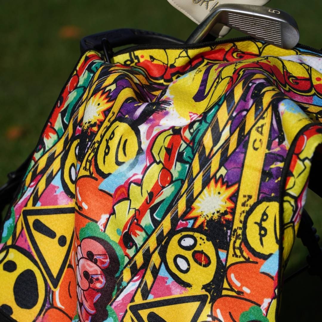 Close up of cool golf towel laying on bag