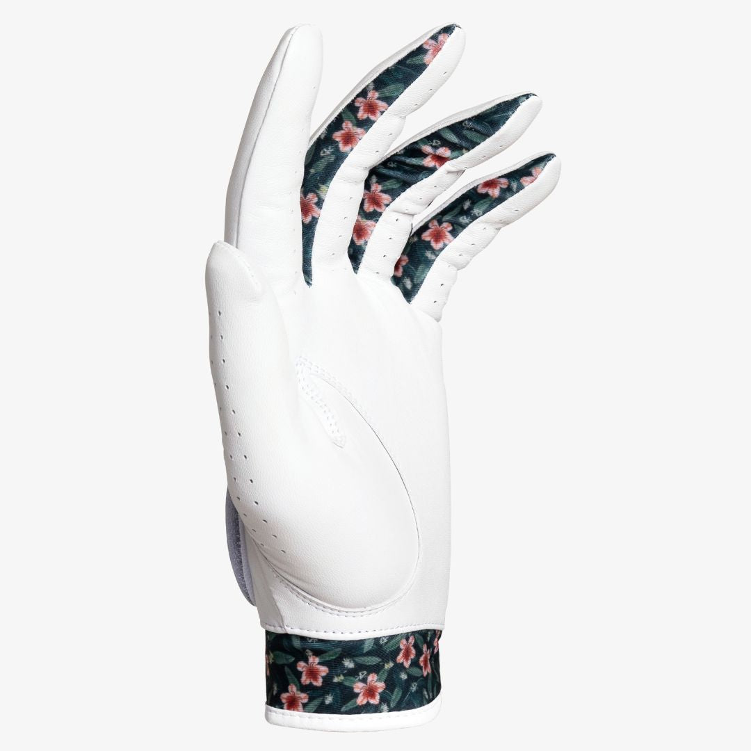 White golf glove with floral pattern on a white background