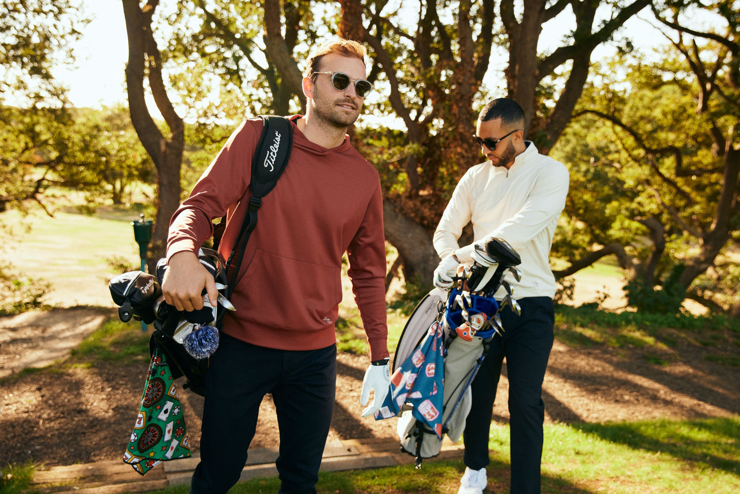 Golfers wearing golf hoodies and q-zips