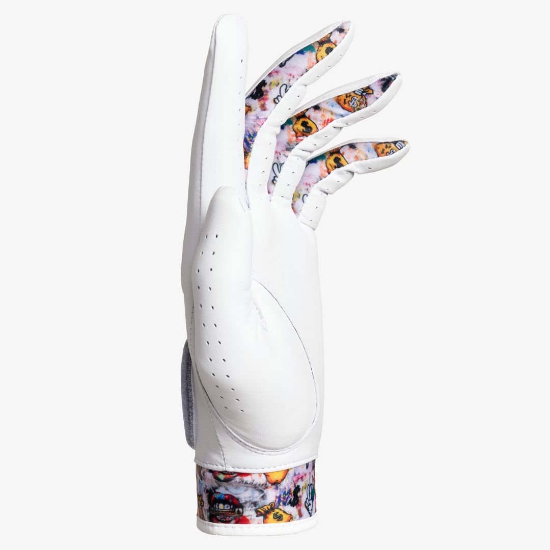 White golf glove with cool pattern on wrist and between fingers.