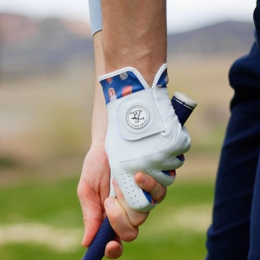 Cabretta leather golf glove with whiskey themed design