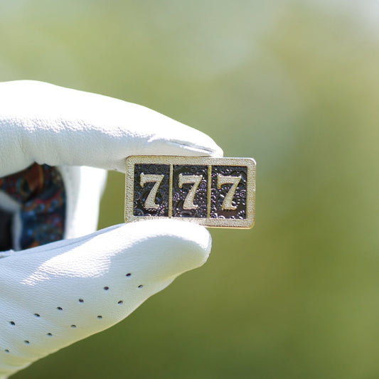 777 golf ball marker