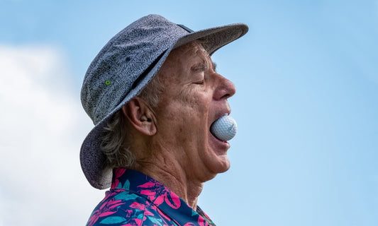 Person eating a golf ball