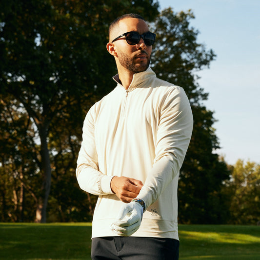 Man wearing a golf quarter zip