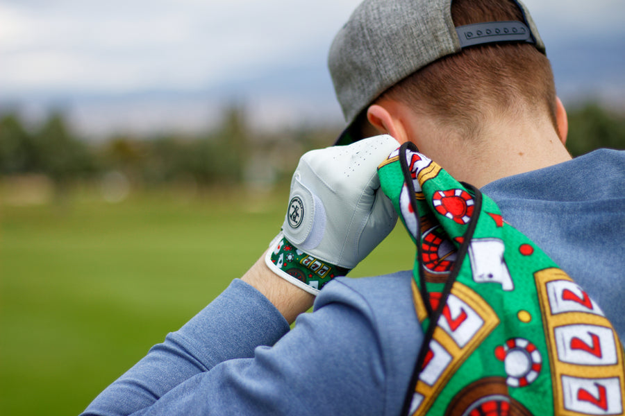 Golfer holding cool golf towel