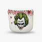 White golf headcover with a graphic design of a Joker's face and text on a white background.