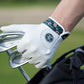White golf glove with floral wristband on a blurred golf course background