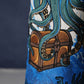 Decorative golf headcover with ocean-themed design featuring an octopus and treasure chest.