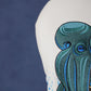 Close-up of a detailed octopus design on a golf headcover with a dark blue background.