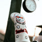 Golf club head cover with gorilla  character design on a blurred background
