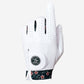 White golf glove with floral pattern on the wristband on a white background