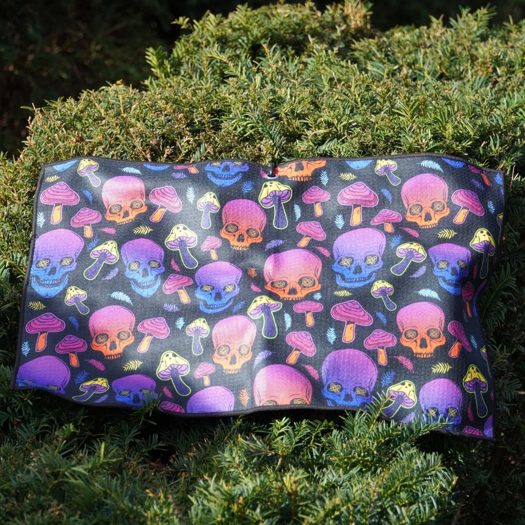 Golf towel with skulls design