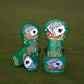 Two green golf club head covers with poker-themed designs on a green background