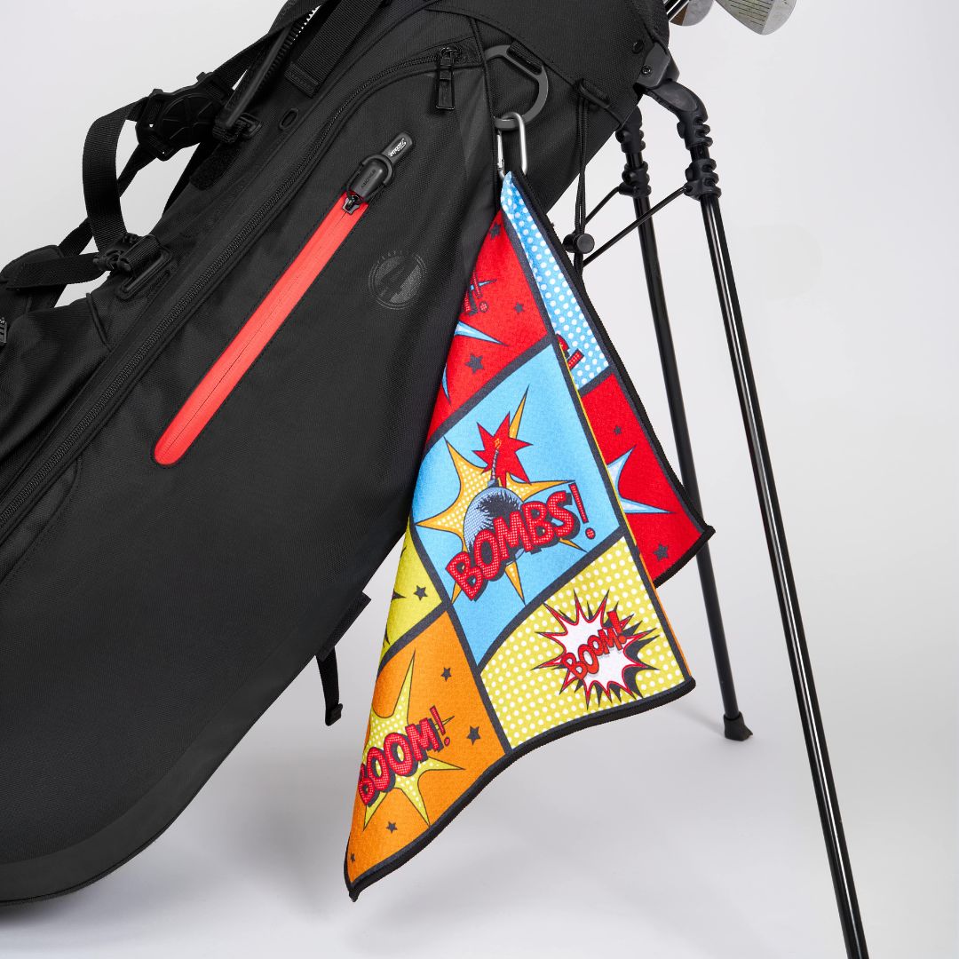 Cool golf towel with comic themed bombs design