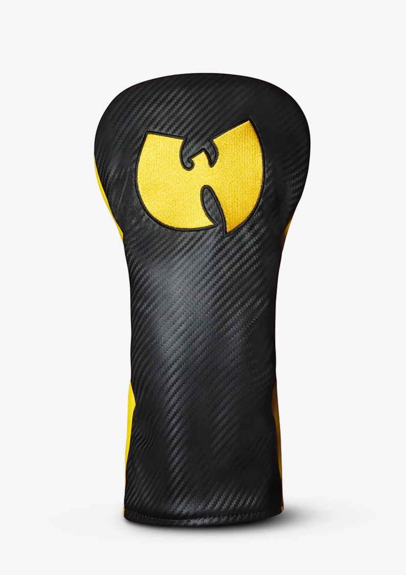 A golf club headcover featuring a black carbon fiber pattern with a prominent yellow Wu-Tang Clan logo on the front, set against a plain light gray background.