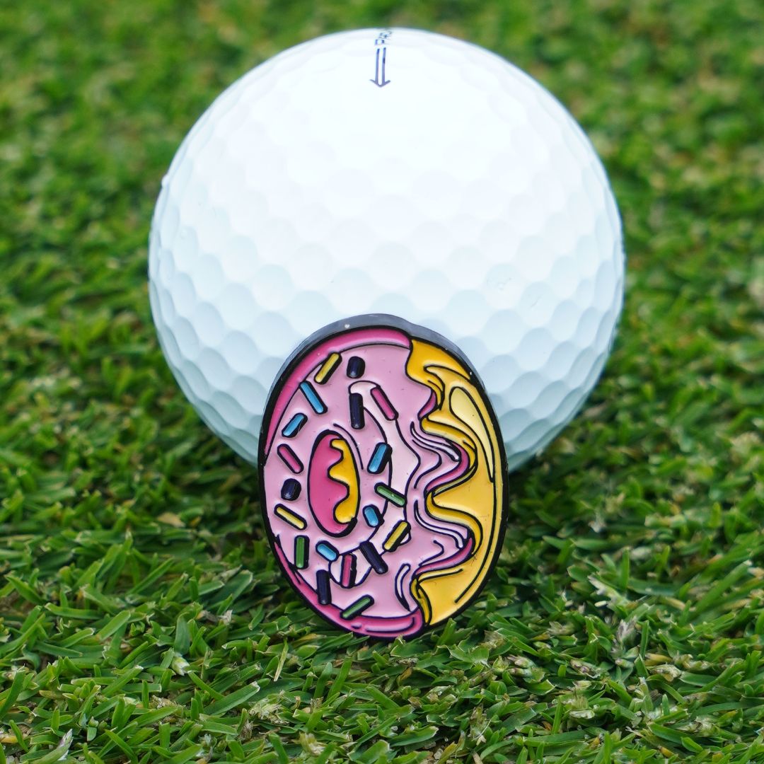 Fun golf ball marker with donut design