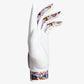 White golf glove with cool pattern on wrist and between fingers.
