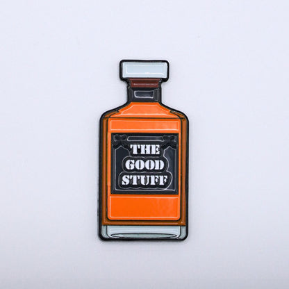 golf ball marker with whiskey design