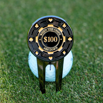 Golf ball with a chip marker on grass