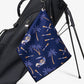 Golf towel with palm tree and golf cart pattern on a black golf bag
