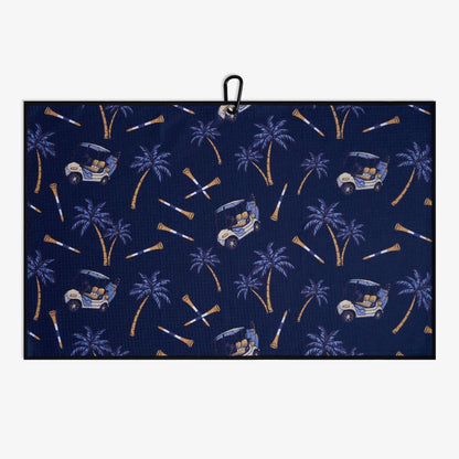 Navy blue towel with palm tree and golf cart pattern on a white background
