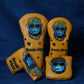 Set of golf club head covers with monkey design on a blue background