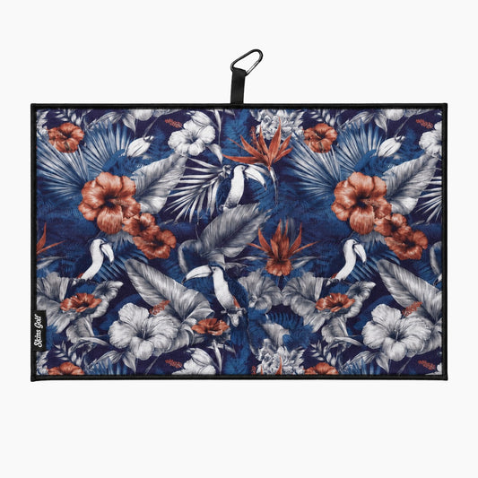 Floral patterned towel with a black clip on a white background