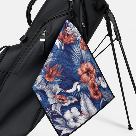 Floral towel with blue background on a golf bag stand