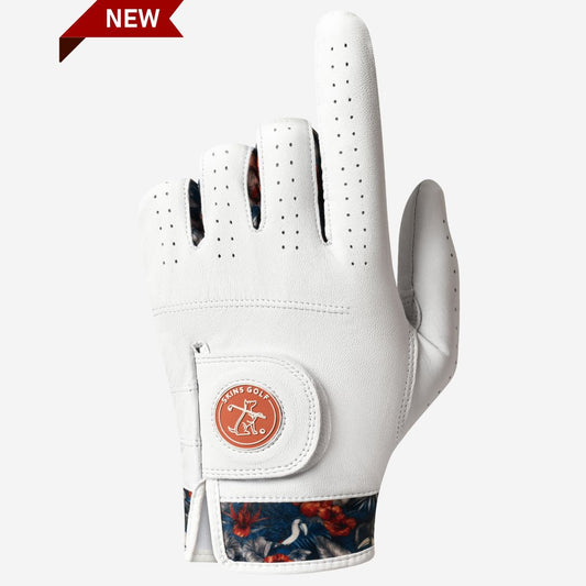 White golf glove with floral cuff and brand logo on a white background