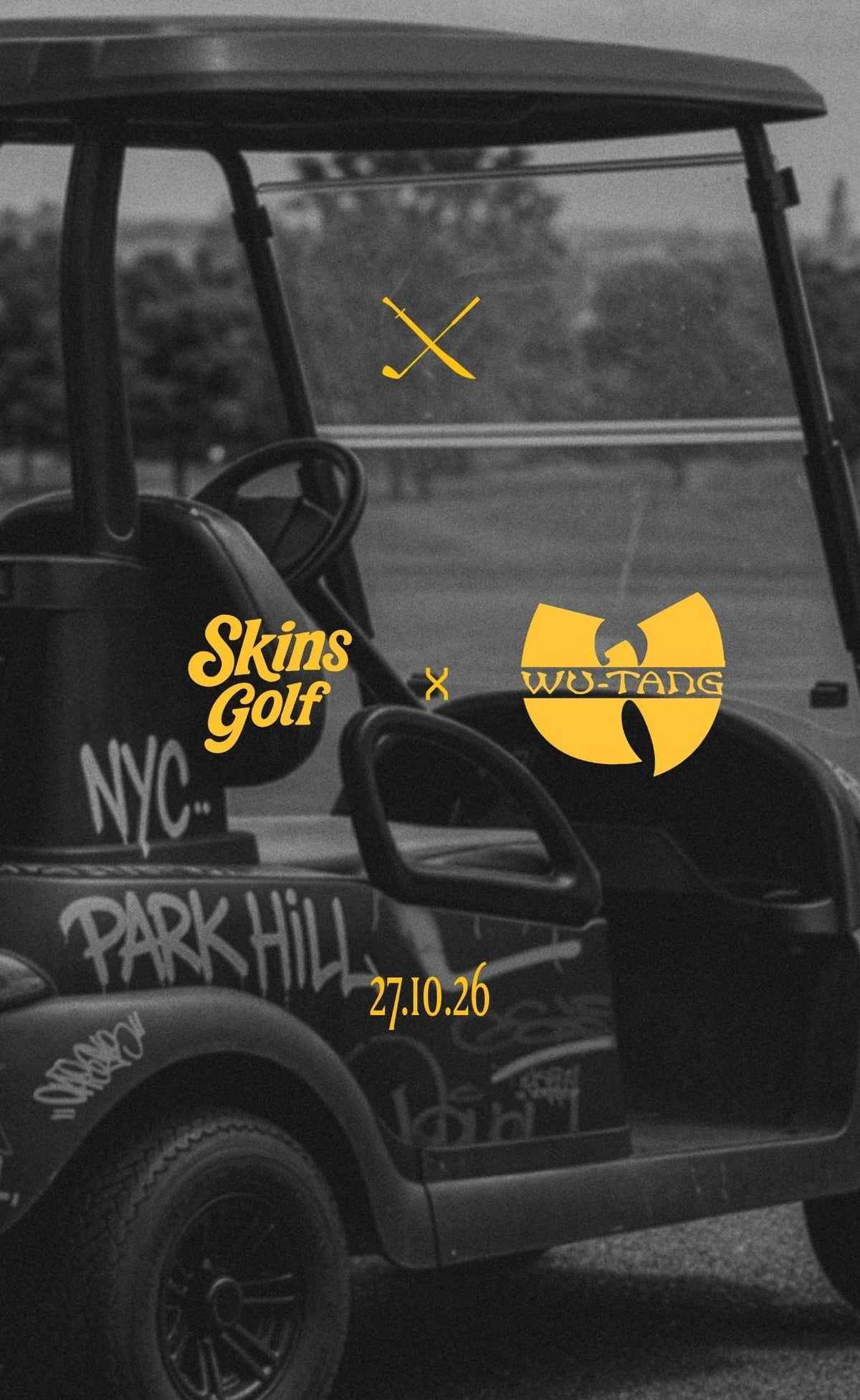 A black golf cart in an outdoor setting with yellow graphic logos and text, including 'Skins Golf', 'Wu-Tang', and 'NYC'.