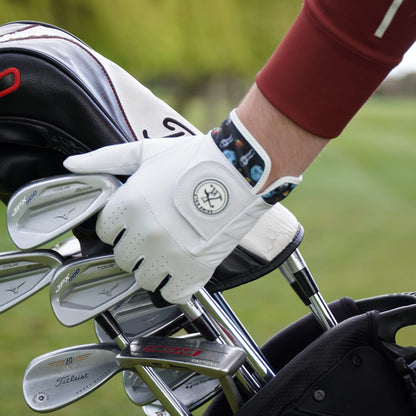 Golf glove with astronaut & moon design