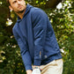 Golfer wearing navy hoodie